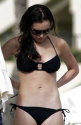 Lindsay Lohan having her tits grabbbed at the beach