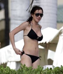 Lindsay Lohan having her tits grabbbed at the beach