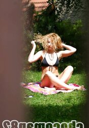 Spying on my neighbor tanning naked in backyard