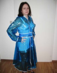 Wifey in girdle and PVC Raincoat