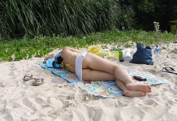 Korean nymph naked at the beach