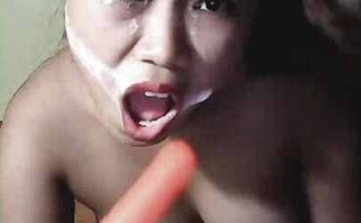 Bangkok teenager sloppy face faux-cock display on webcam