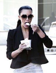 Kim Kardashian cleavy in ebony headed to Katsuya Restaurant