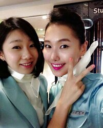 Korean air hostess takes self pictures