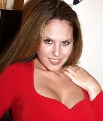 Stunner puts on crimson top - super-cute breasts