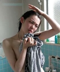 Chinese lady taking a shower