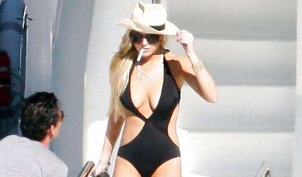 Lindsay Lohan ... In Taut Ebony Bathing Suit