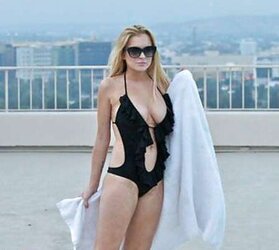 Lindsay Lohan ... In Taut Ebony Bathing Suit