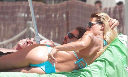 Steamy Pregnant Celeb Michelle Hunziker in Bathing Suit three German