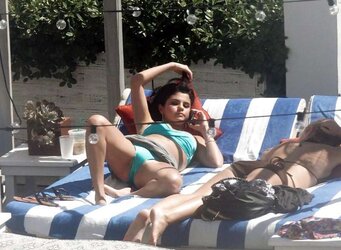 Selena Gomez - bathing suit with open up gams