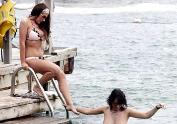 Lucy Pinder and Sophie Howard nude on a beach