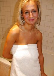 Huge-Boobed blond in the shower