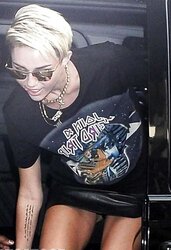 Miley Cyrus Magnificent slide upskirt shopping in London July