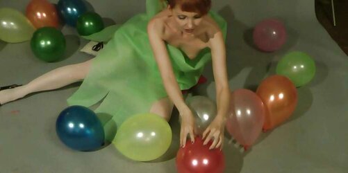 Redhead lean Lisa popping balloons