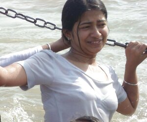 Indian Women bathing at sea ganga