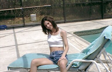 Black-Haired revealing herself by the pool