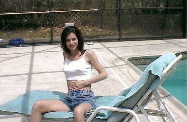 Black-Haired revealing herself by the pool