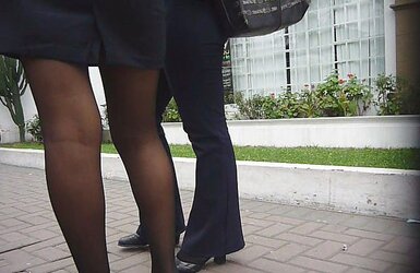 Spy Student Flight Attendant in Ebony Stockings.