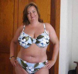 Big-Boobed mature amatuer posing in bathing suit