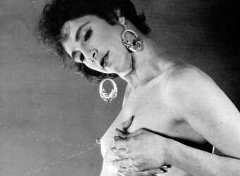 Vintage dark-haired Molly milking her bra-stuffers