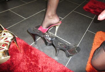 Lovely tiny high-heeled slippers and nylon chick eyeing for penis