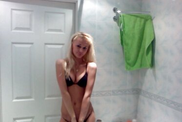 Stellar blond posing in bathroom