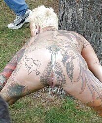 Tatted huge mature exhibitionist