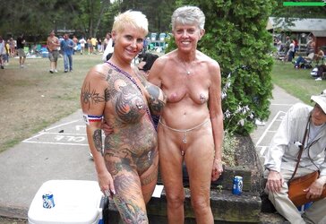 Tatted huge mature exhibitionist