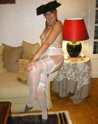 Gorgeous Female Opium in pantyhose and high-heeled slippers