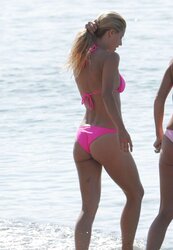 Michelle Hunziker rosy Bathing Suit on the beach in Varigotti