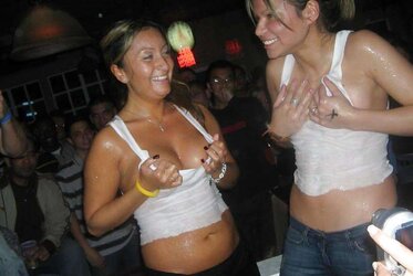 Women in a bar with raw t-tee-shirts