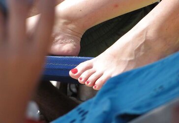 Naked soles polished toenails