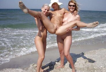 trio nude cousins displaying in the river beach